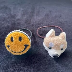 Two Cute hair ties from Japan- (dog/ only used once)(smile / never used)